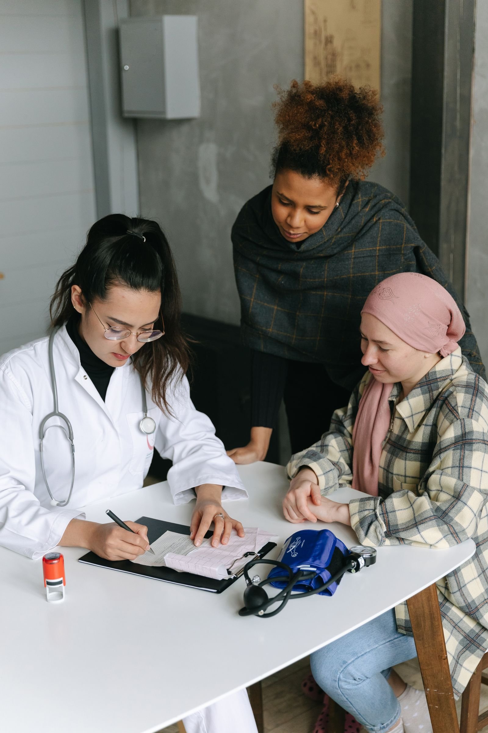 Doctors consulting with a patient