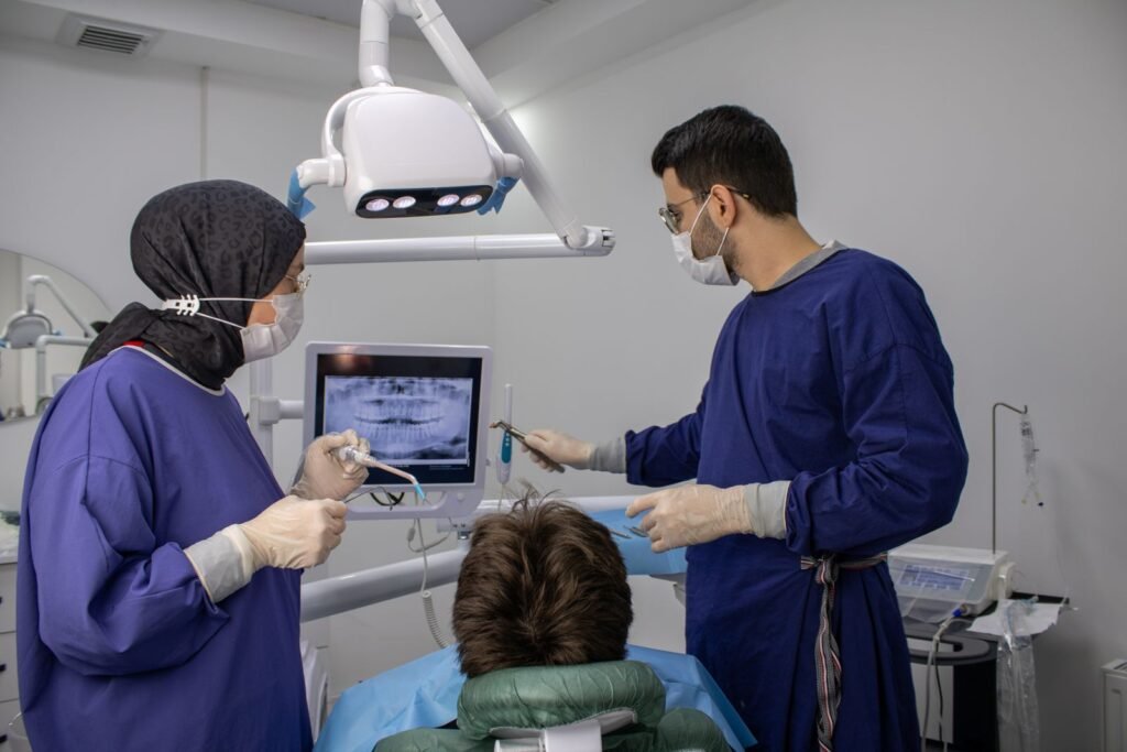 Dental team treating a patient